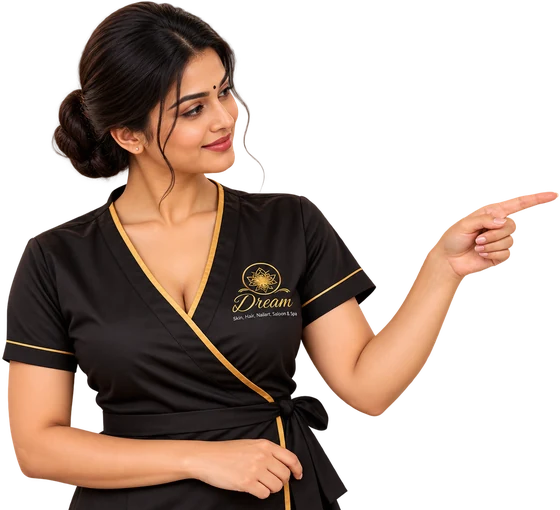 Dream Wellness Spa therapist pointing to WhatsApp booking